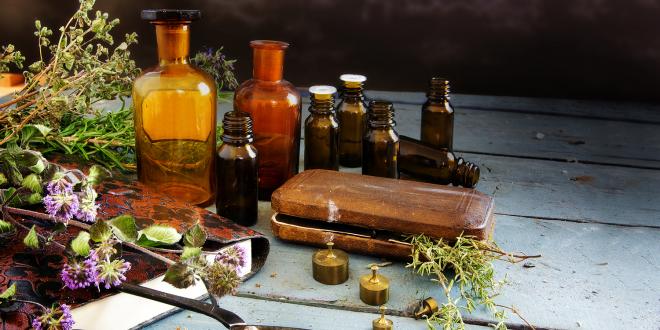 Bitter herbs, scissors and apothecary bottles